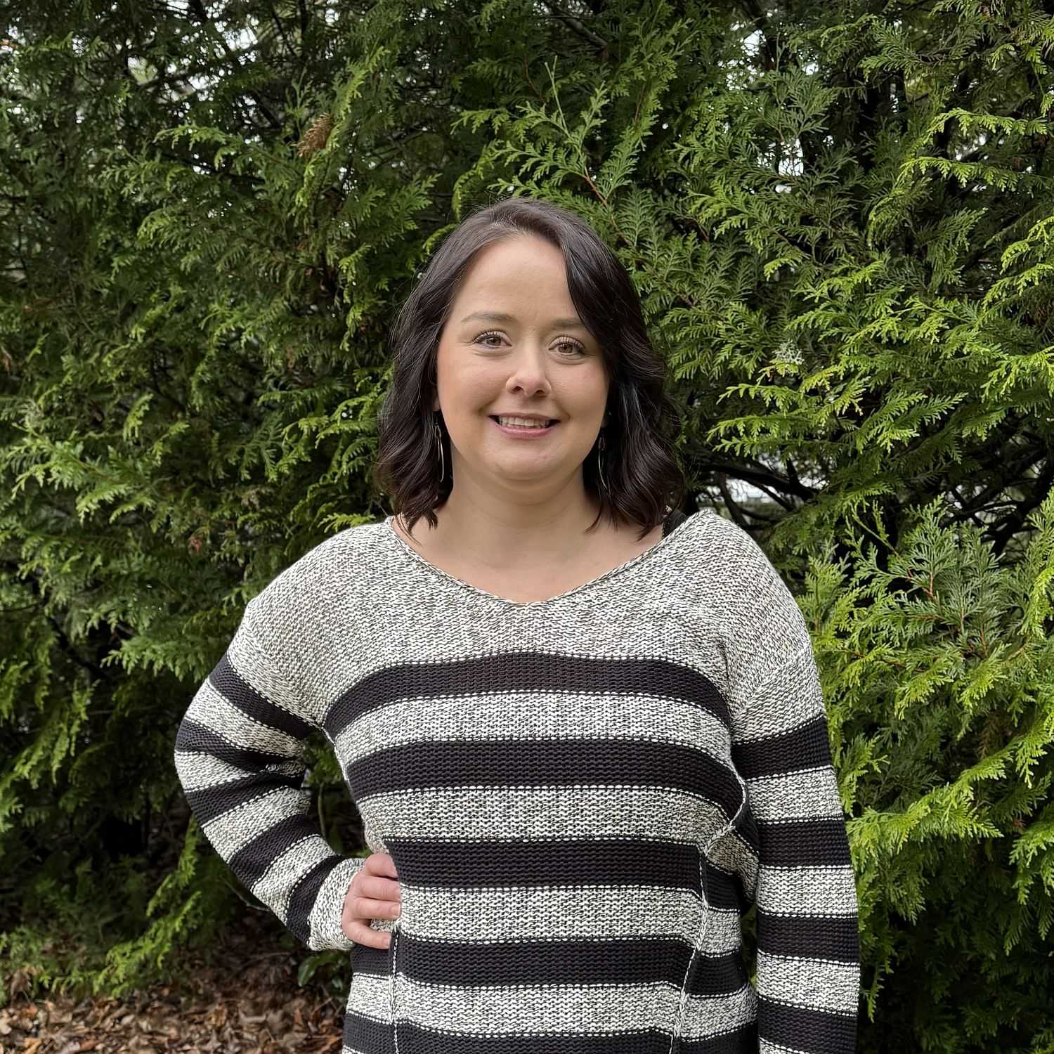 Portrait of Amanda Bender, a professional stylist at Robert Allan Salon, showcasing their expertise and style.