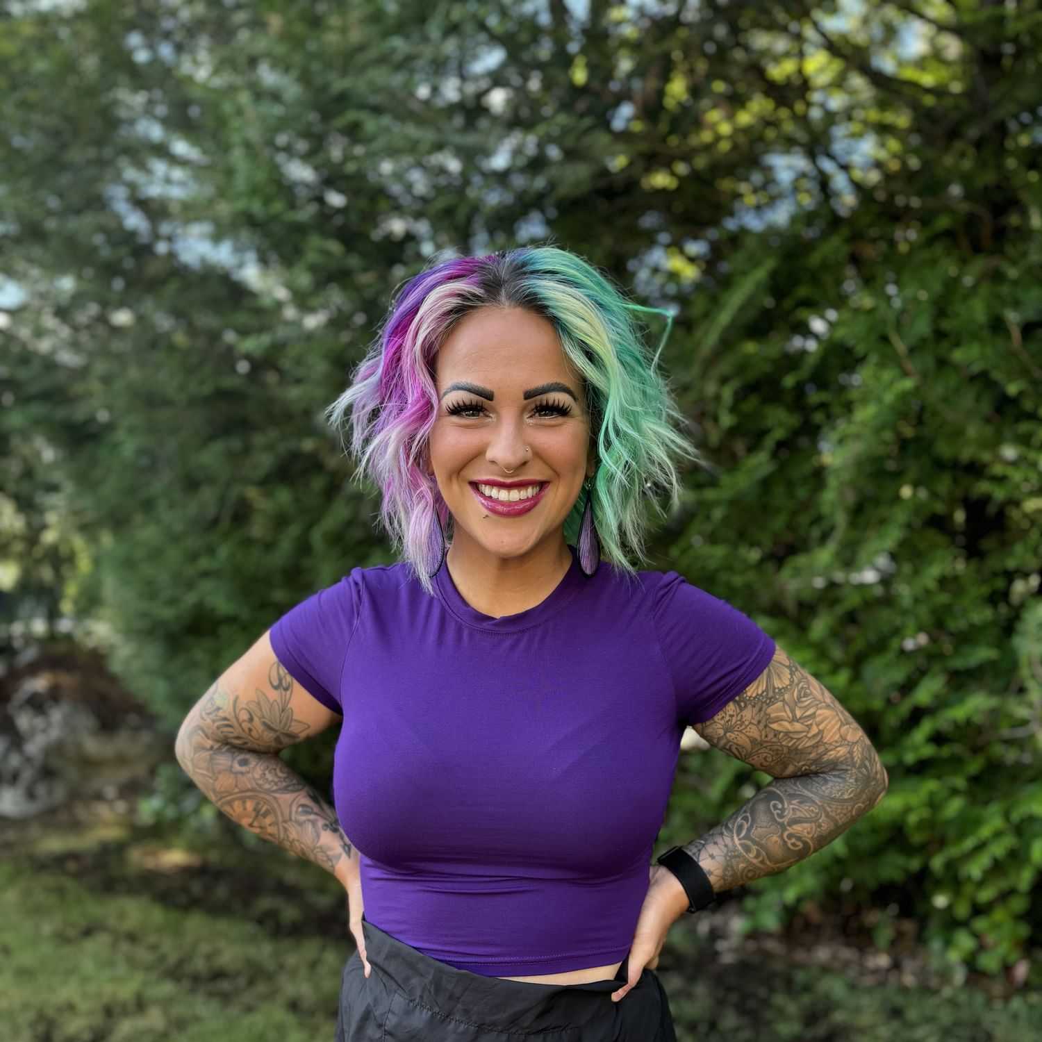 Portrait of Ashley Stanford, a professional stylist at Robert Allan Salon, showcasing their expertise and style.