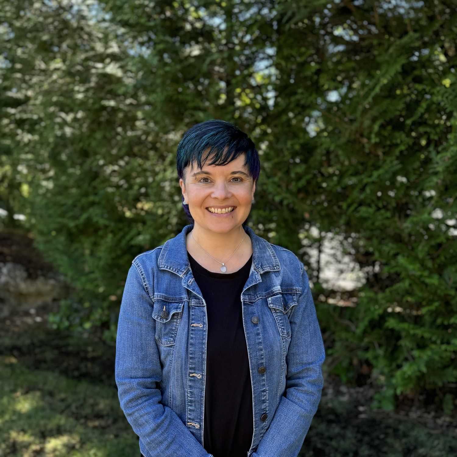 Portrait of Heather Miller, a professional stylist at Robert Allan Salon, showcasing their expertise and style.