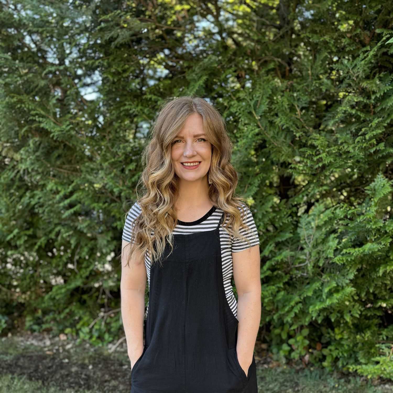 Portrait of Katie Dittmer, a professional stylist at Robert Allan Salon, showcasing their expertise and style.