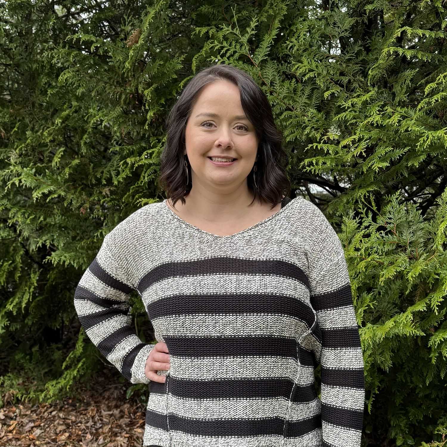 Portrait of Amanda Bender, a professional stylist at Robert Allan Salon, showcasing their expertise and style.